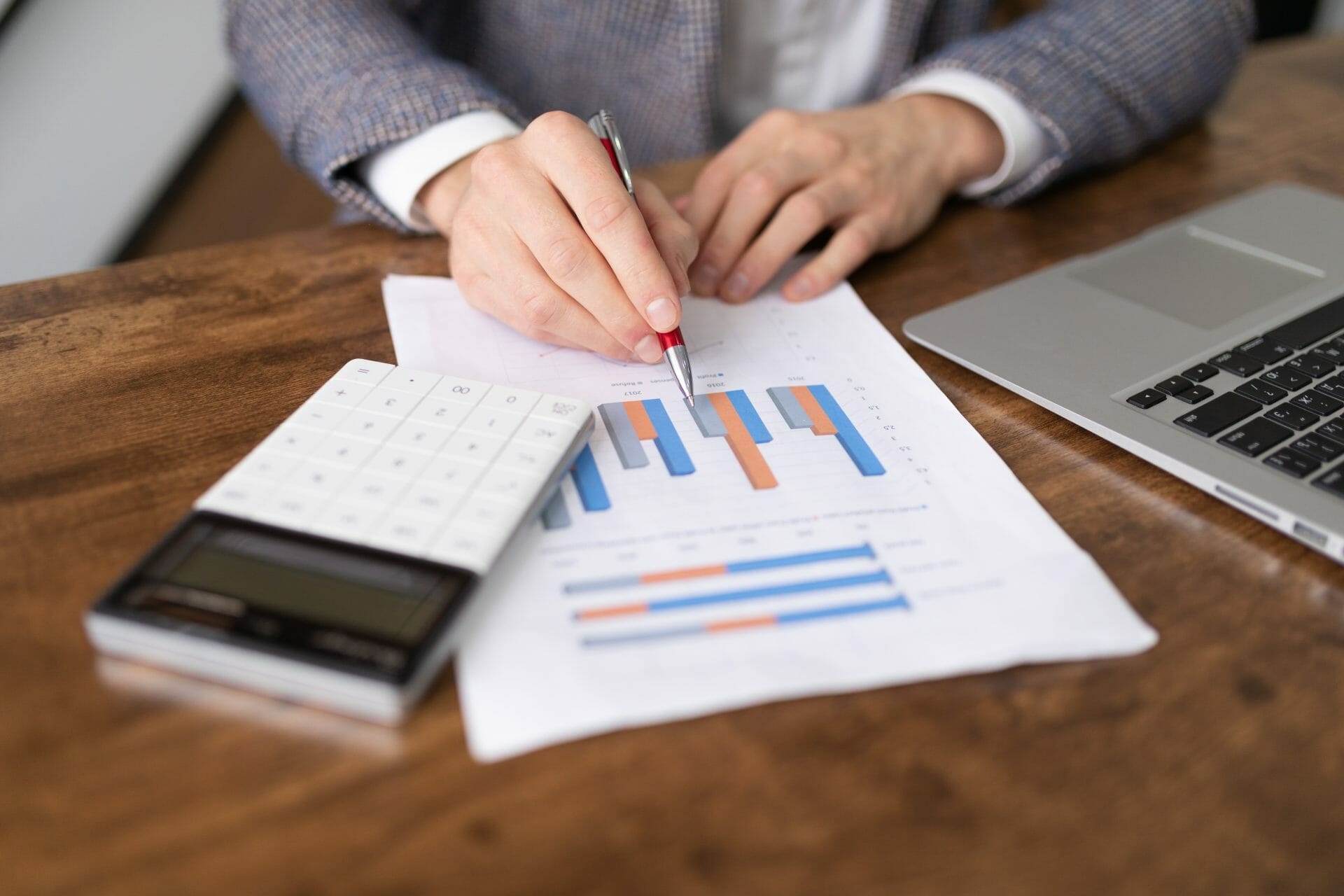 Financial analyst with diagrams of the affairs of 2023 03 24 19 21 21 utc