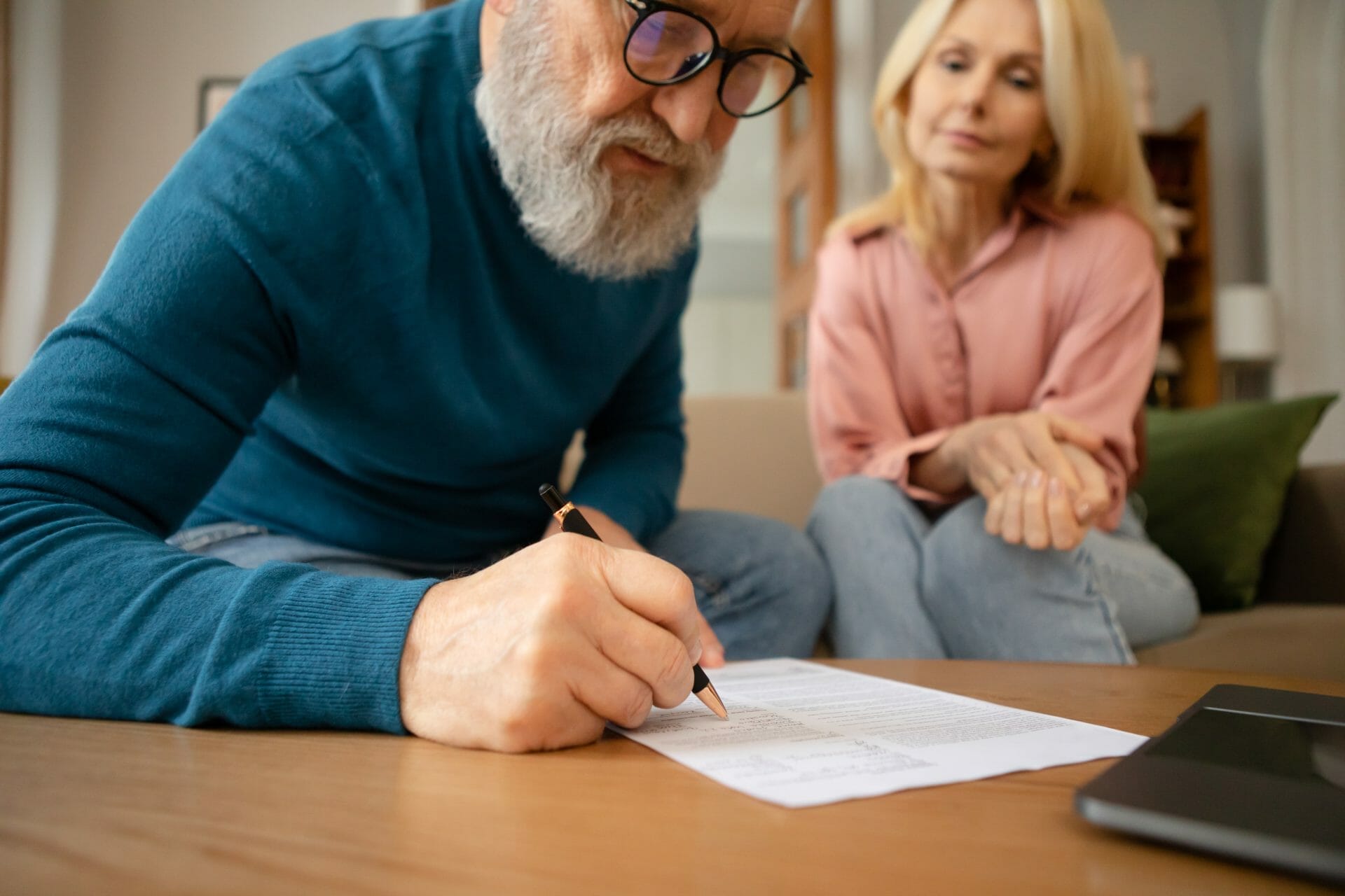 elder law for senior-couple-filling-in-form-signing-papers, concept of tn living trust, lebanon estate lawyer, and elder law planning, revocable living trust tennessee, elder care law